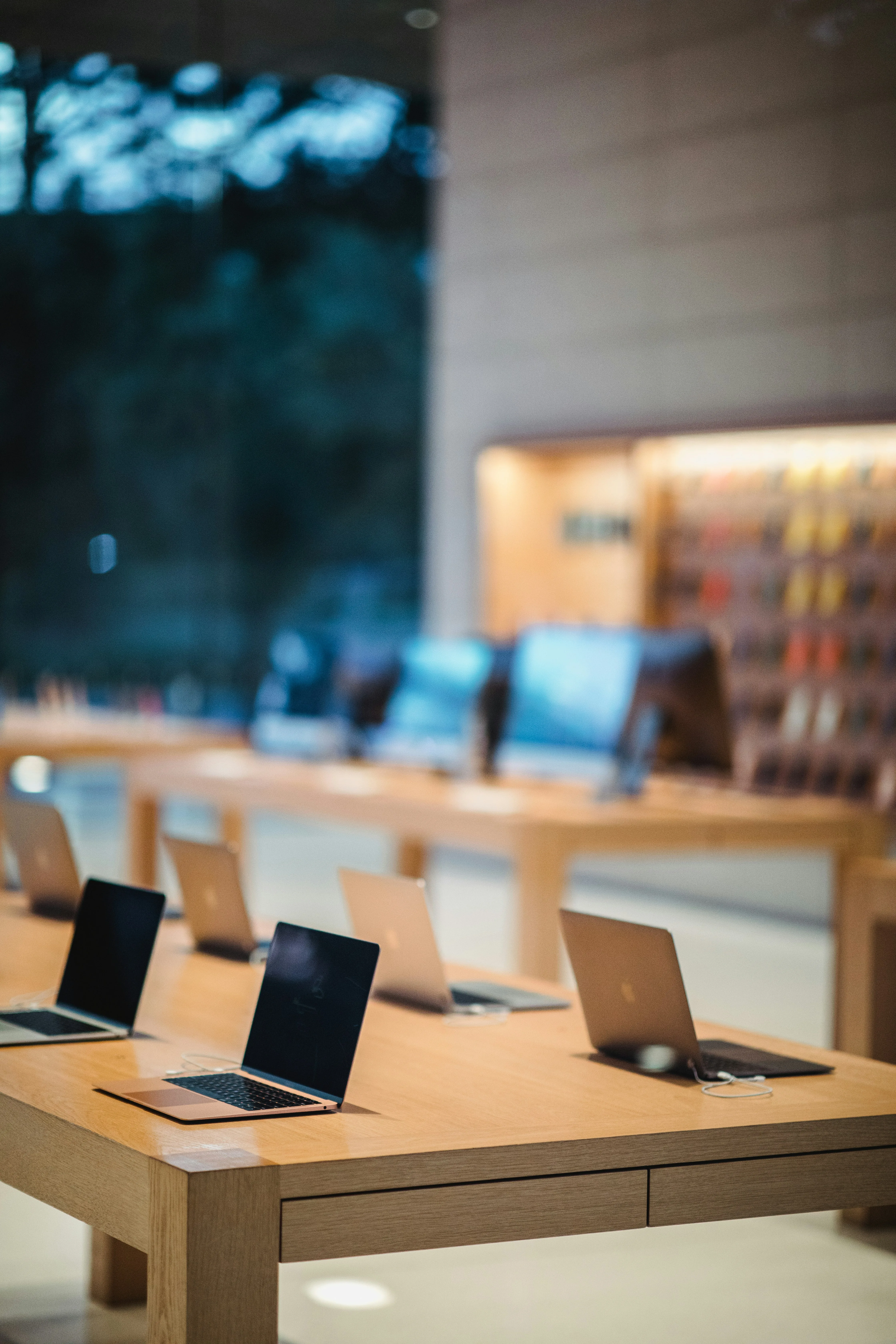 Laptops on display in premium retail store